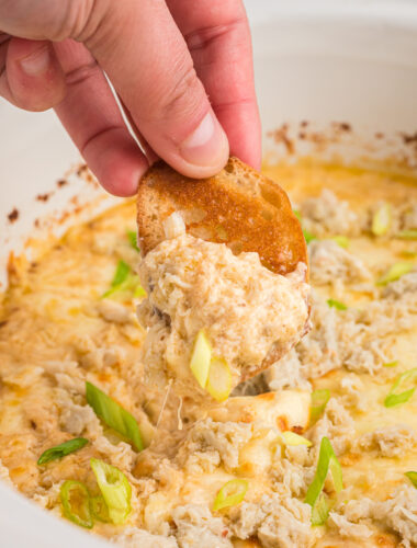 crab dip on a piece of bread.