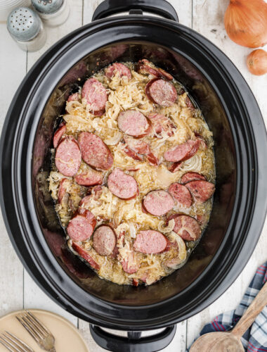 kielbasa and sauerkraut cooked in a slow cooker.