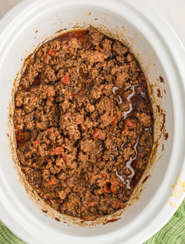 ground beef cooked in slow cooker with taco seasoning and rotel.