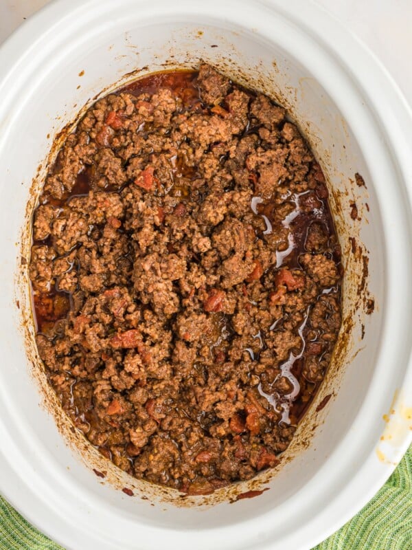 ground beef cooked in slow cooker with taco seasoning and rotel.