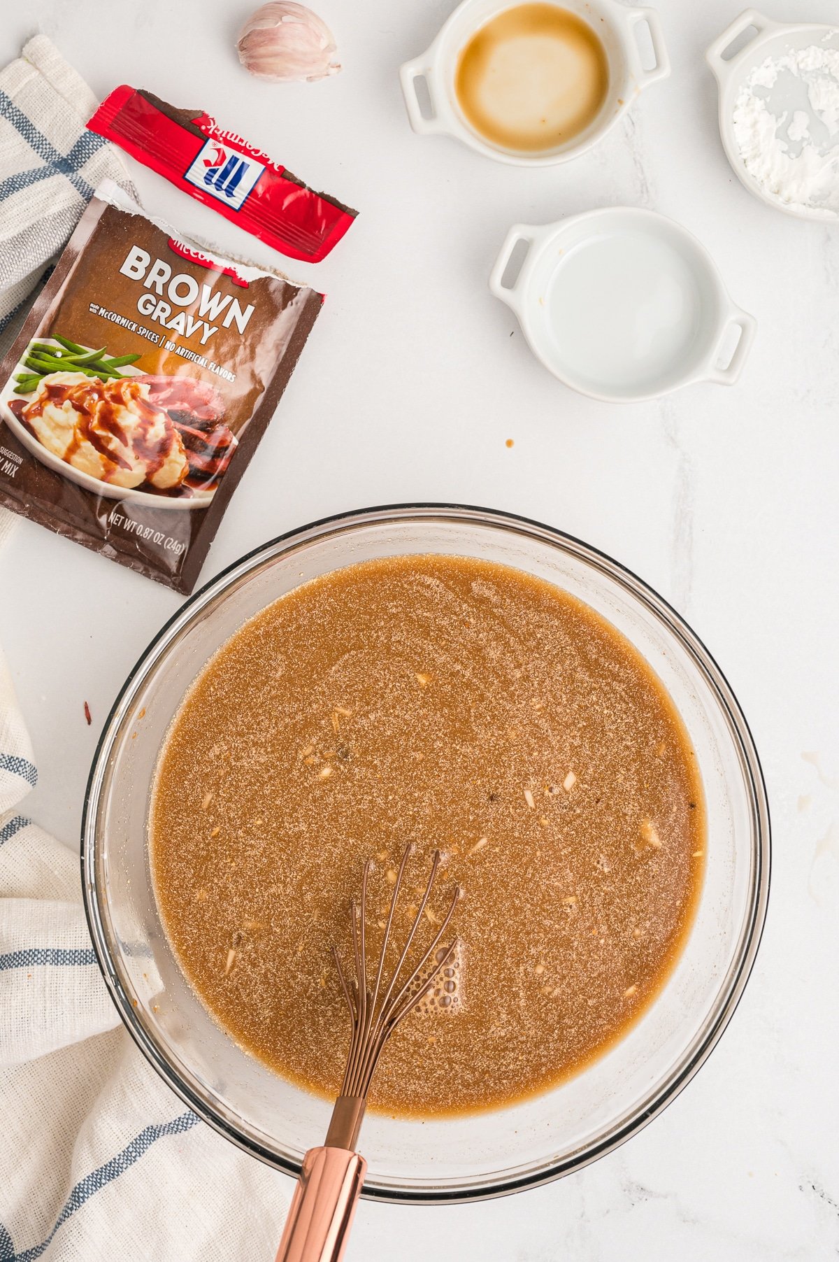 gravy mix, cornstarch and water mixed together in a bowl