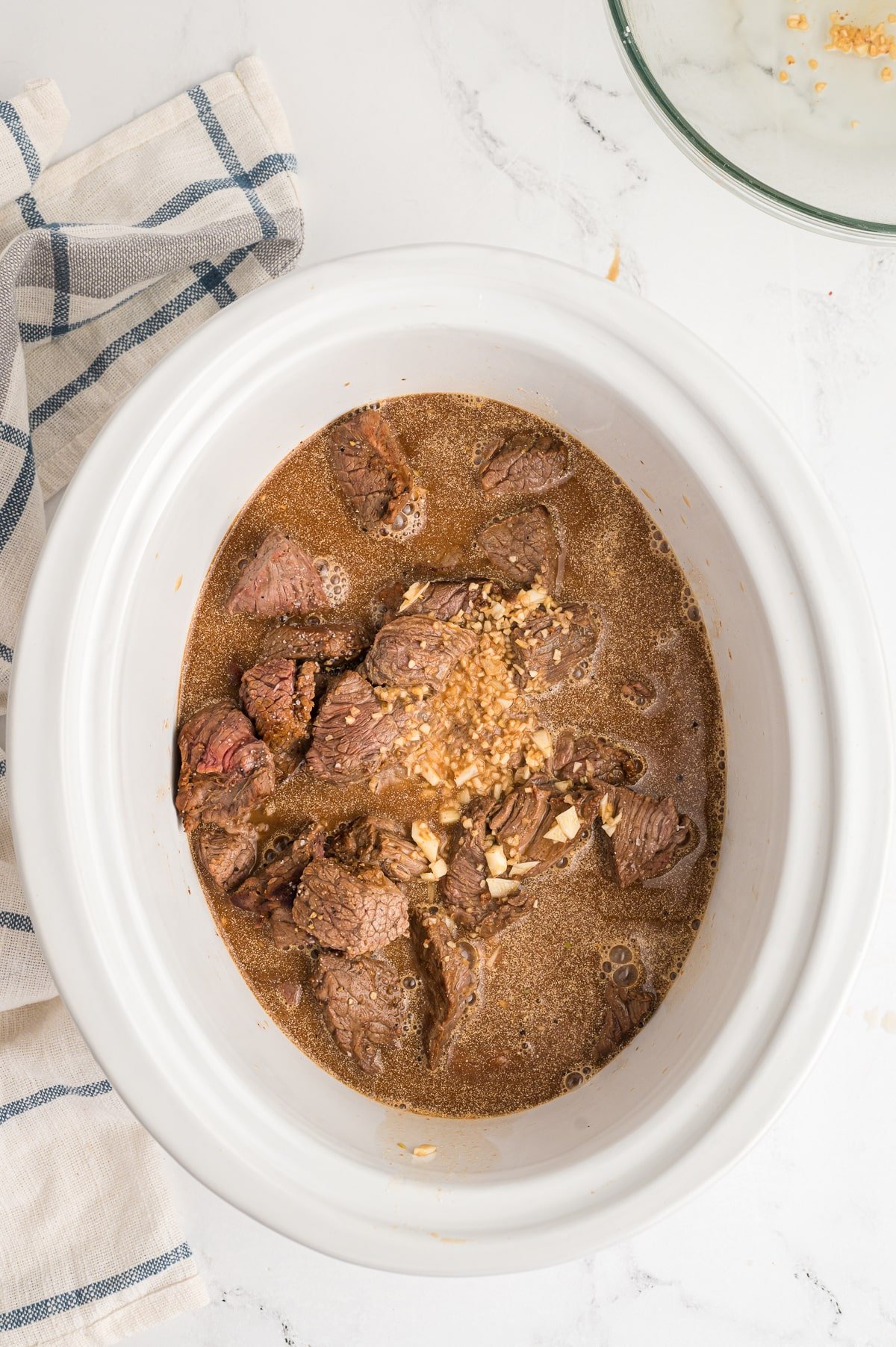 Beef stew meat with the gravy poured over and minced dried onions too.