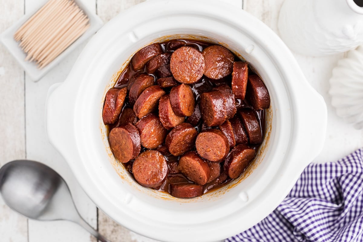 cooked kielbasa in brown sugar, ketchup and horseradish.