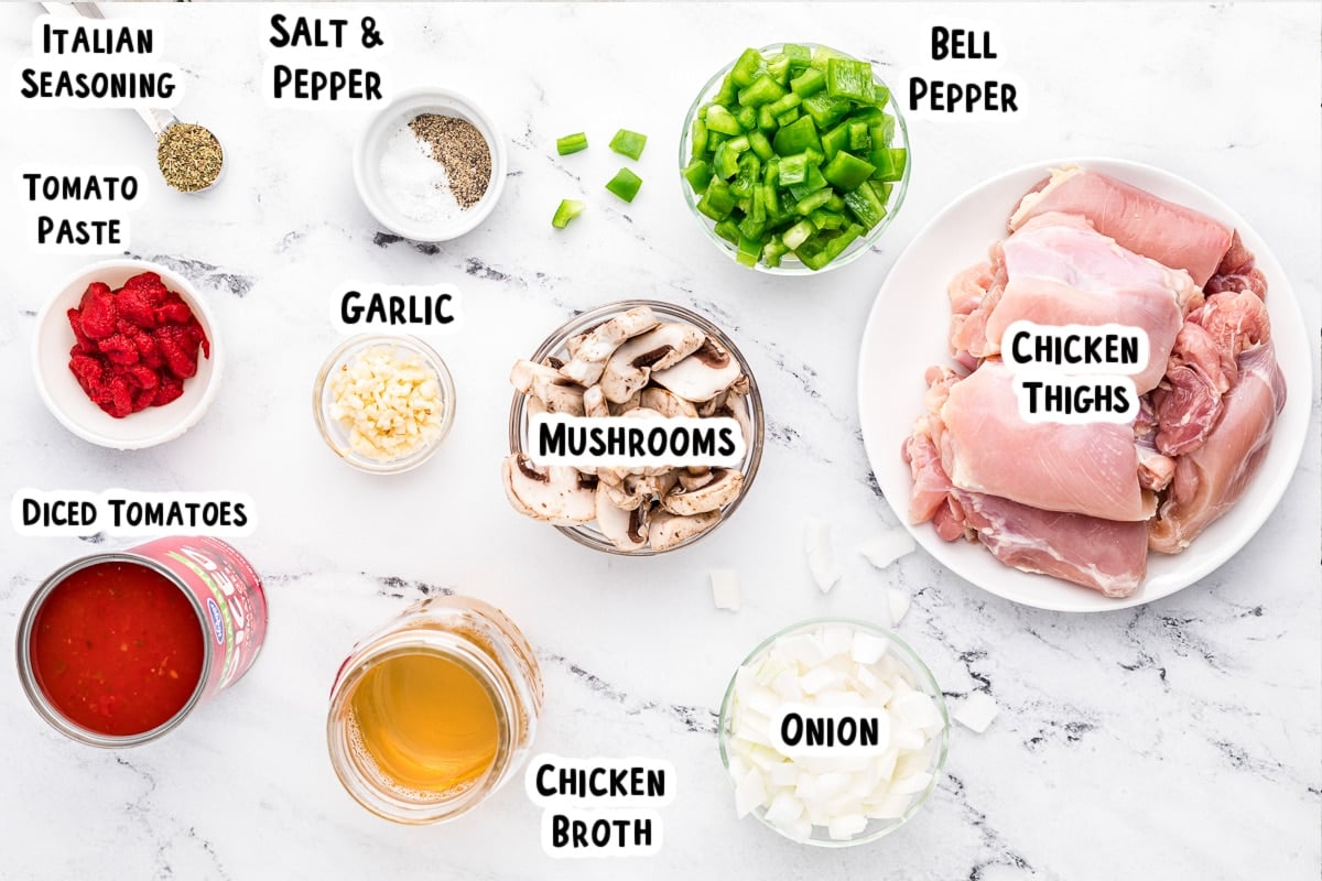 Ingredients for chicken cacciatore on a table.