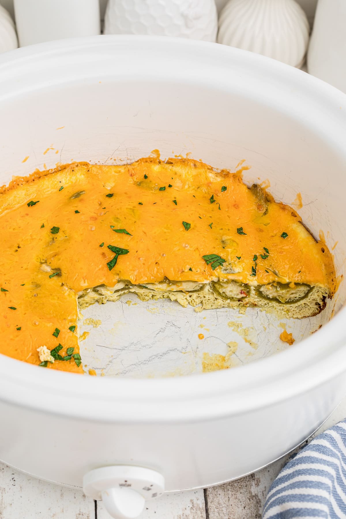 chile relleno casserole with large piece out of it.