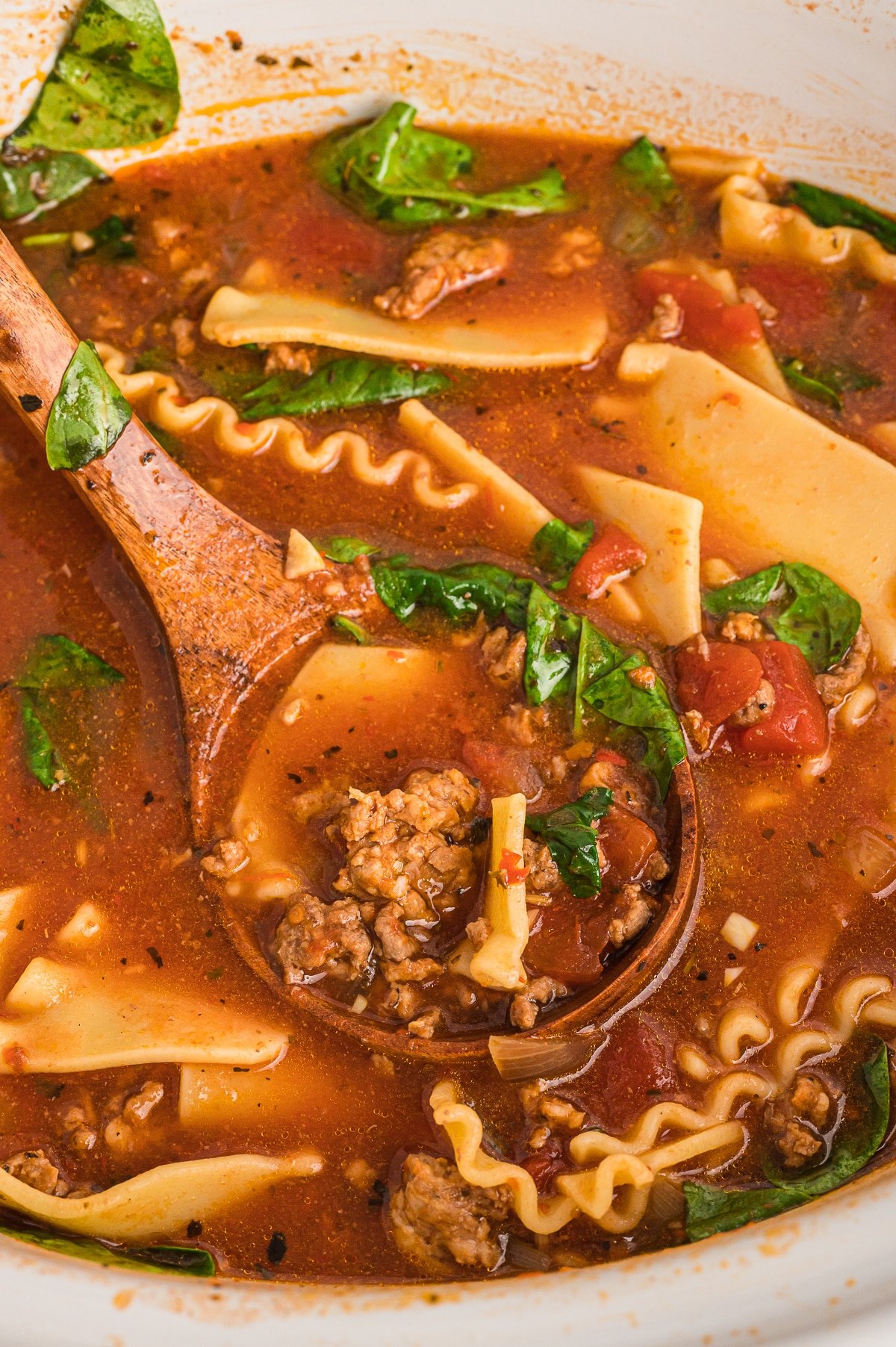 lasagna soup cooked in slow cooker with spinach.