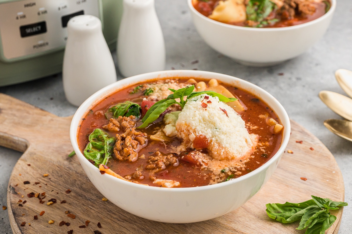 bowl of lasagna soup with ricotta topping.