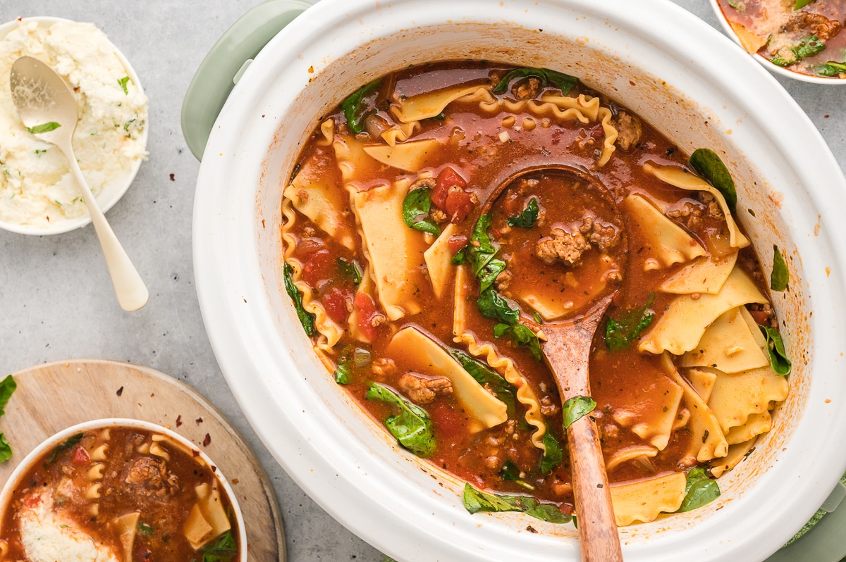 overhead shot of lasagna soup in slow cooker.