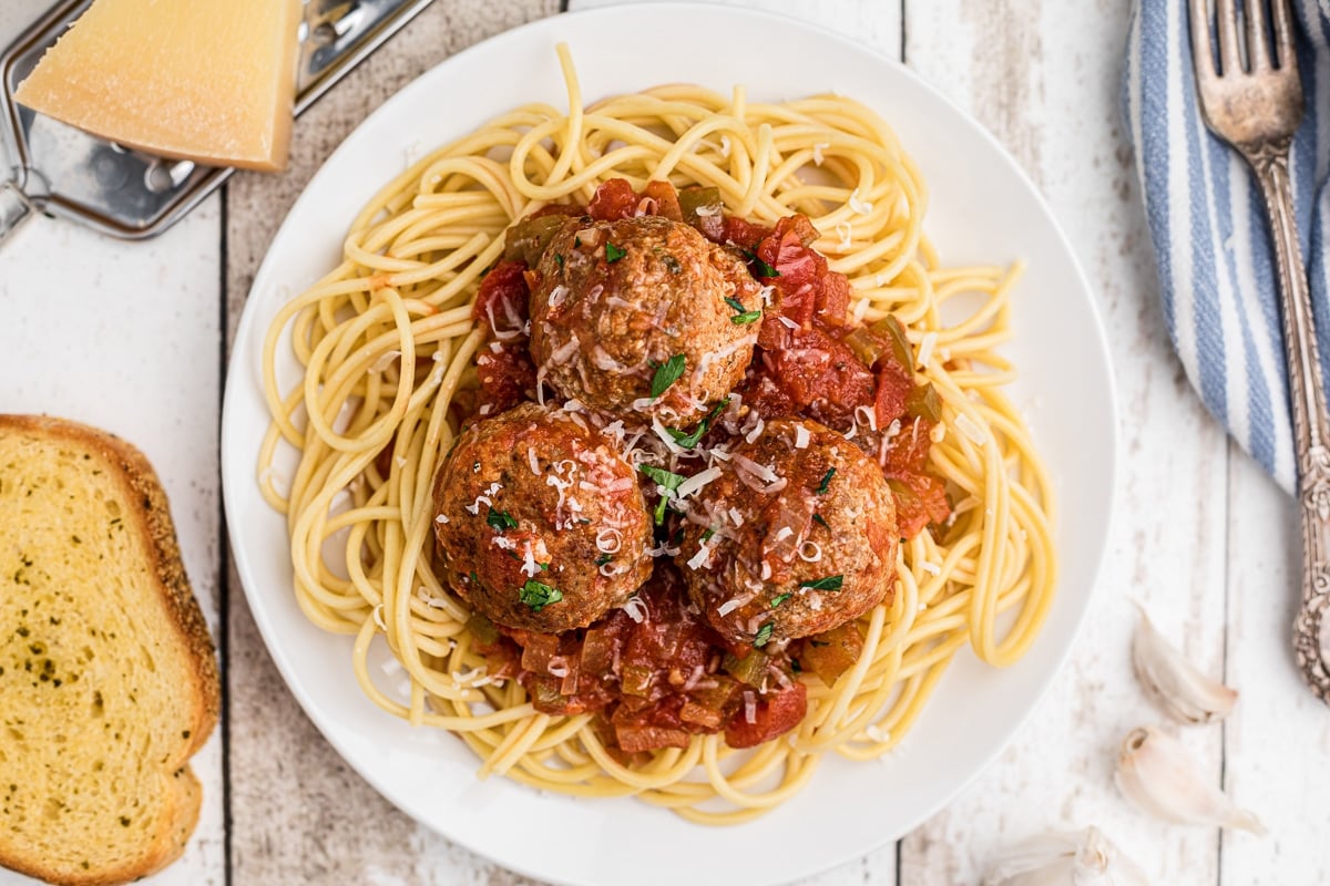 overhead shot of turkey meatballs on spaghetti.