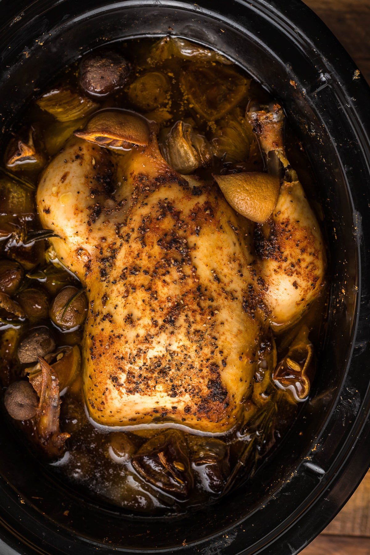 whole chicken cooked with beer in slow cooker.