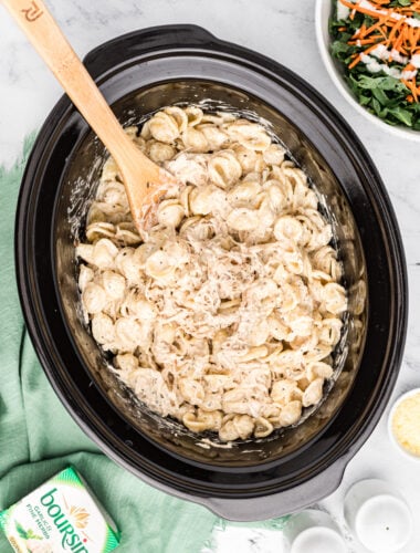 Crockpot full of chicken pasta with boursin cheese.