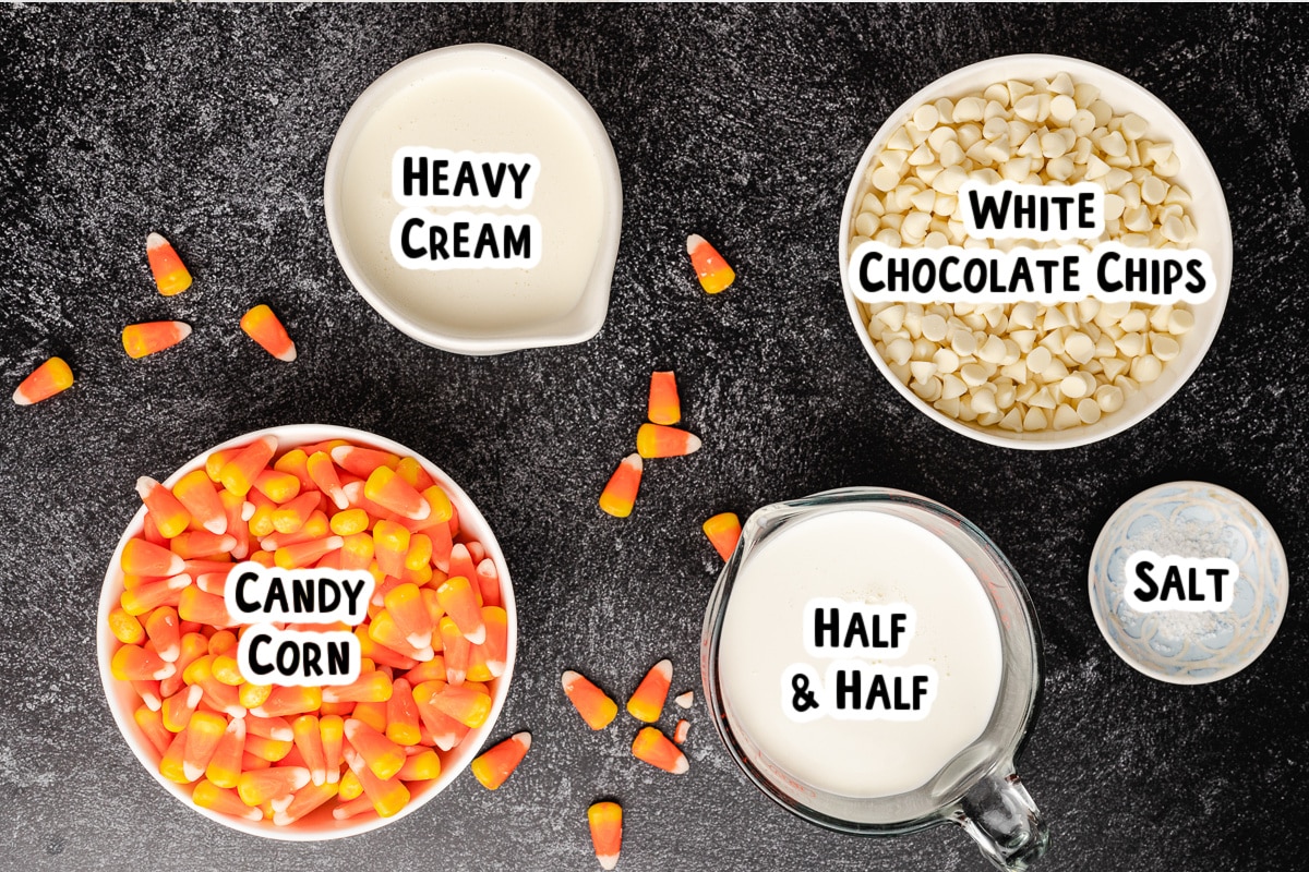 ingredients for candy corn hot chocolate on a table.