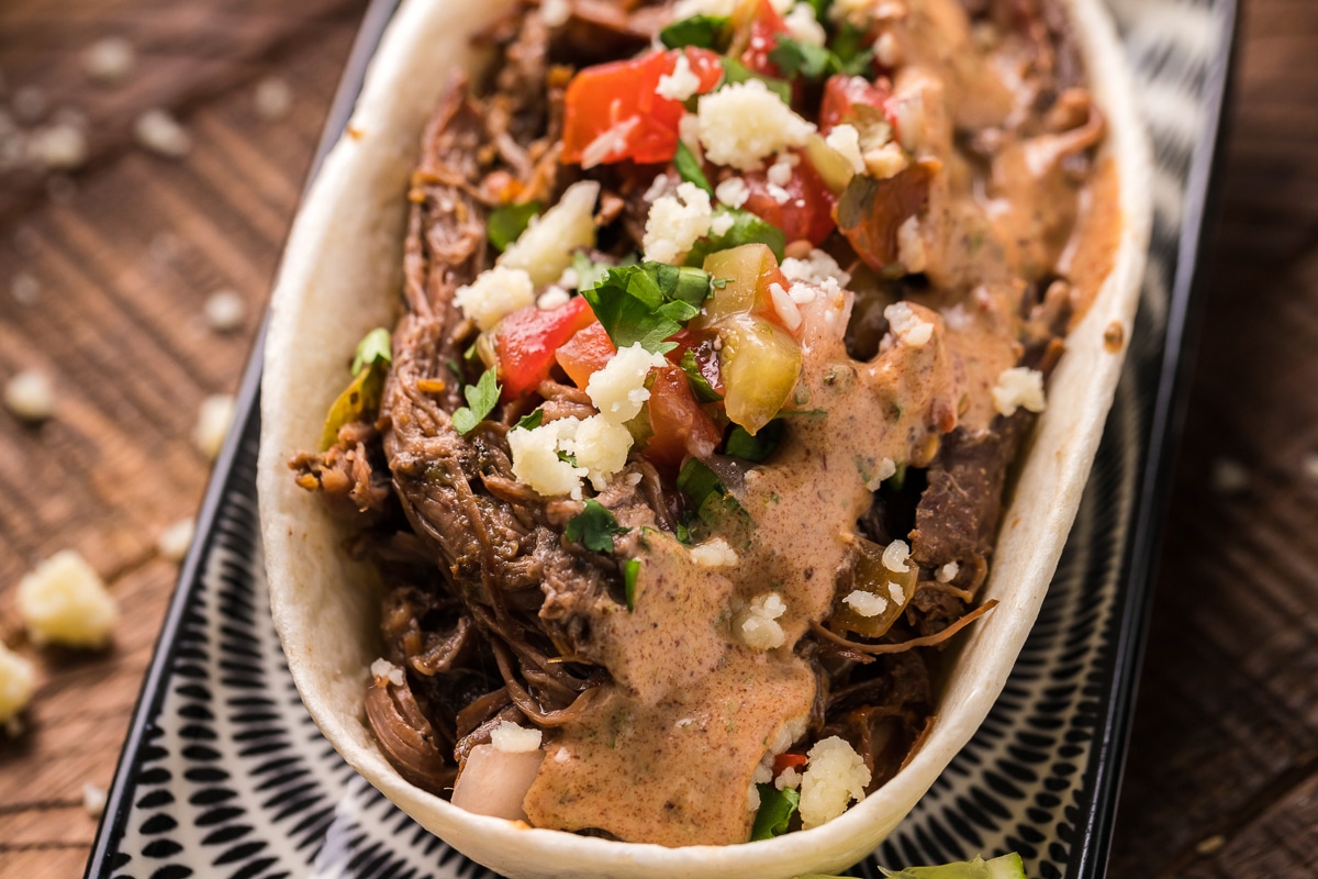 close up of carne asada in taco bowl.