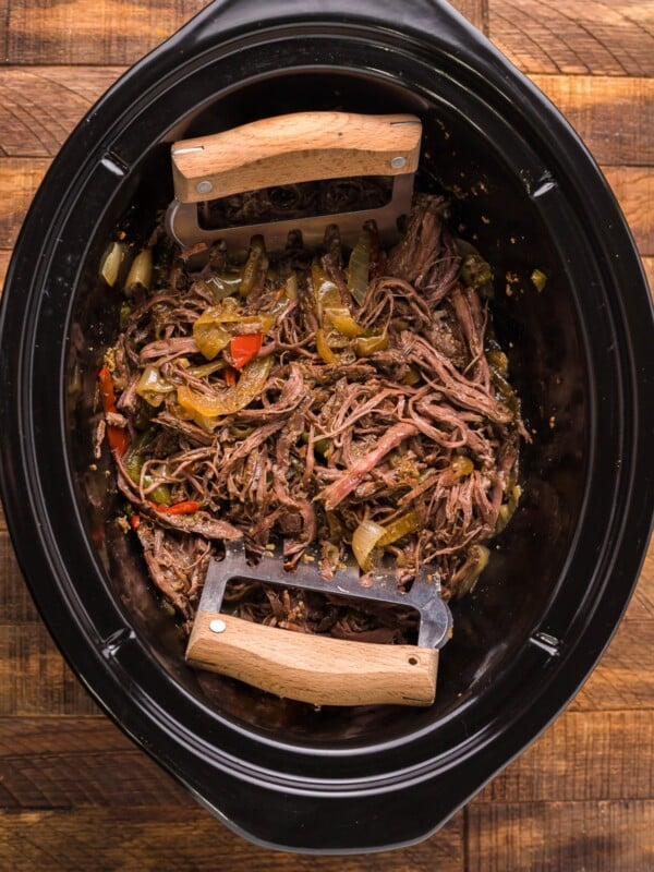 cooked carne asada in slow cooker.