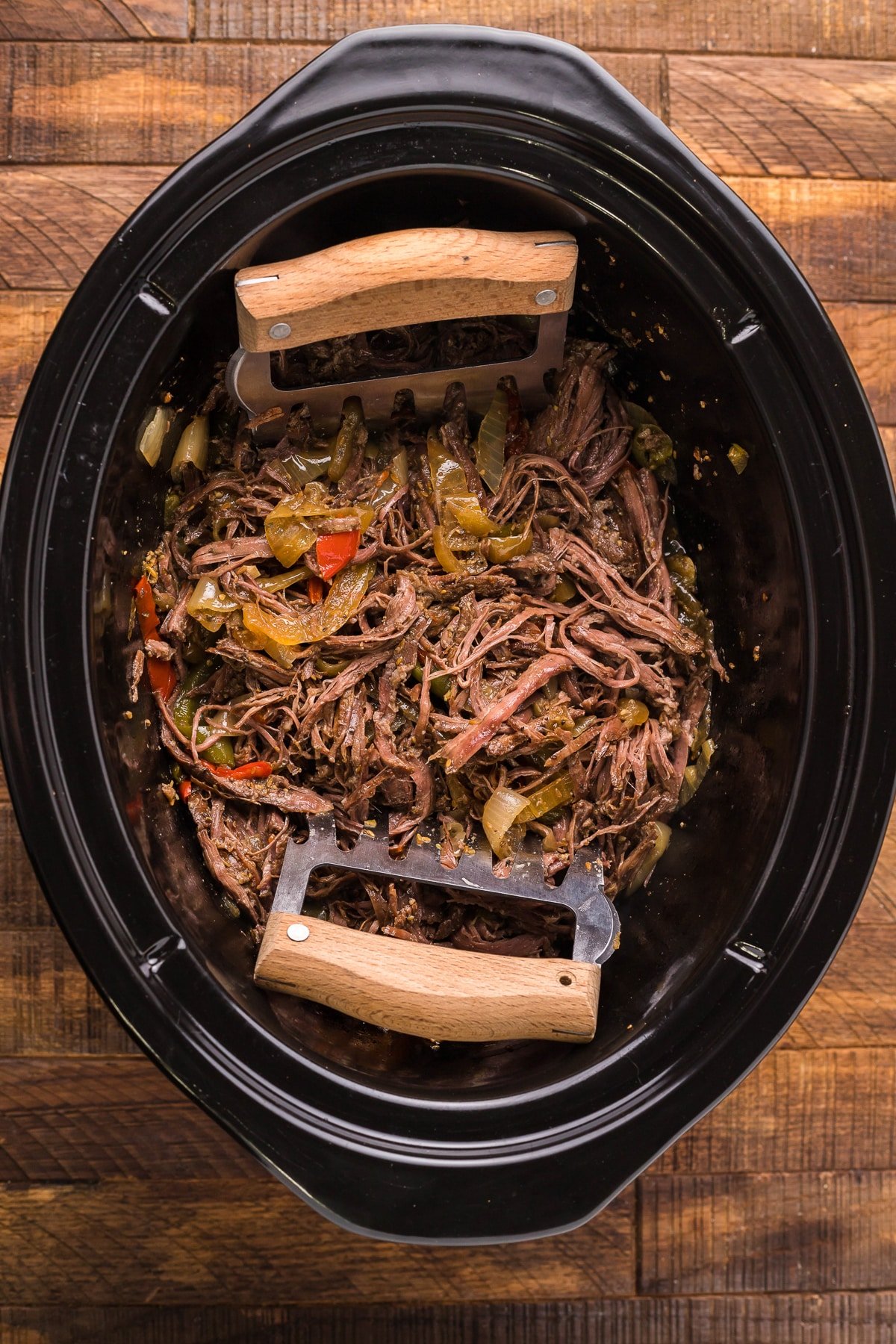 cooked carne asada in slow cooker.