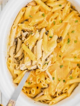 Close up of cheesy chicken penne in slow cooker.