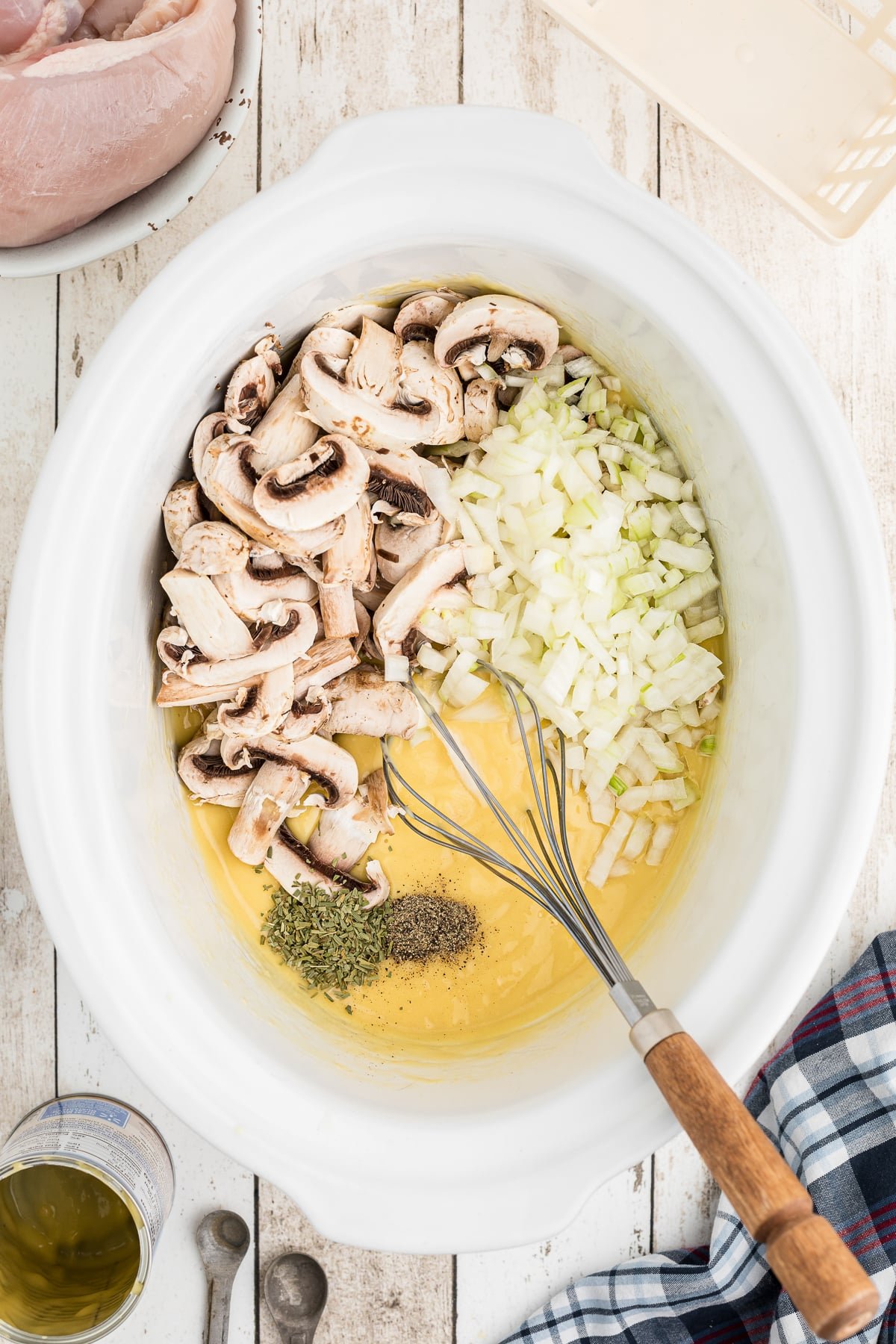cream of chicken soup, chicken broth, veggies and seasonings.