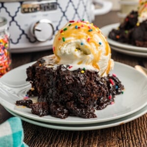 Hot fudge cake with ice cream, caramel and rainbow sprinkles.