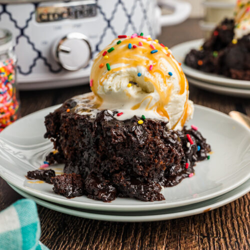 Hot fudge cake with ice cream, caramel and rainbow sprinkles.