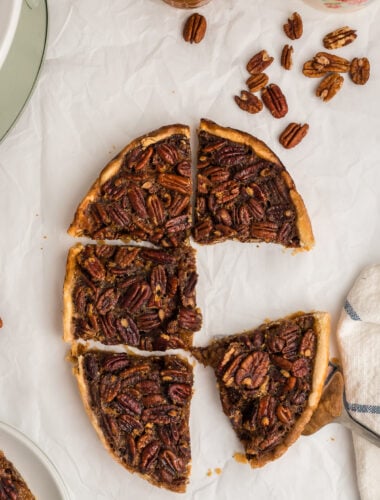 sliced pecan pie next to a slow cooker.