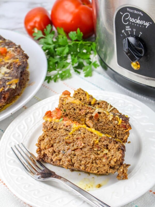 2 slices of meatloaf on a plate.