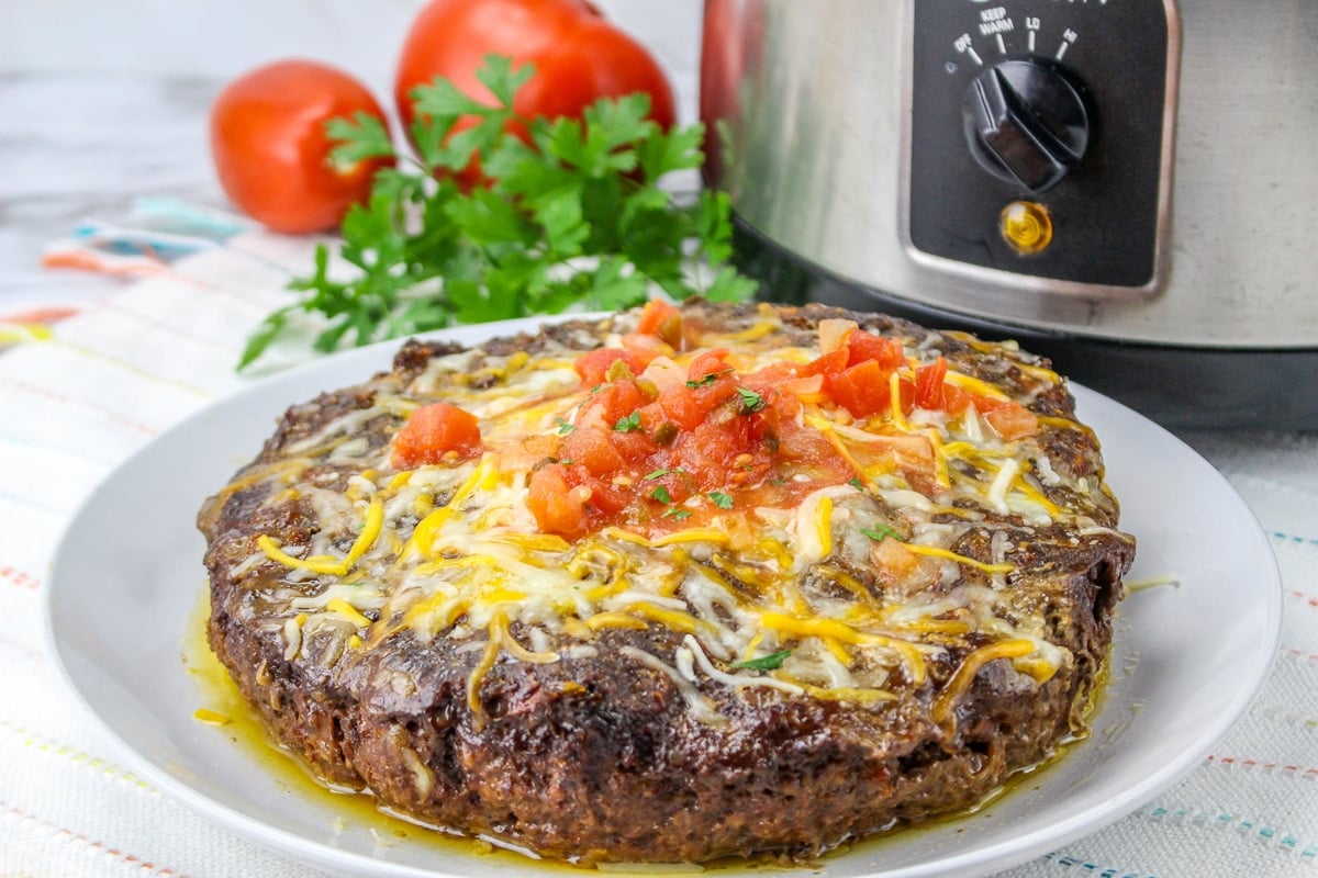 round salsa meatloaf on plate.