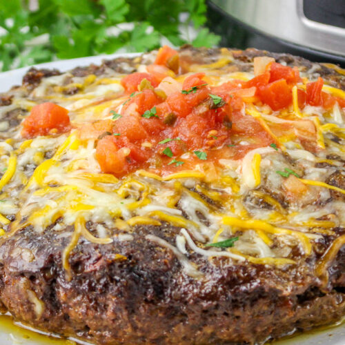 close up of salsa meatloaf on plate.