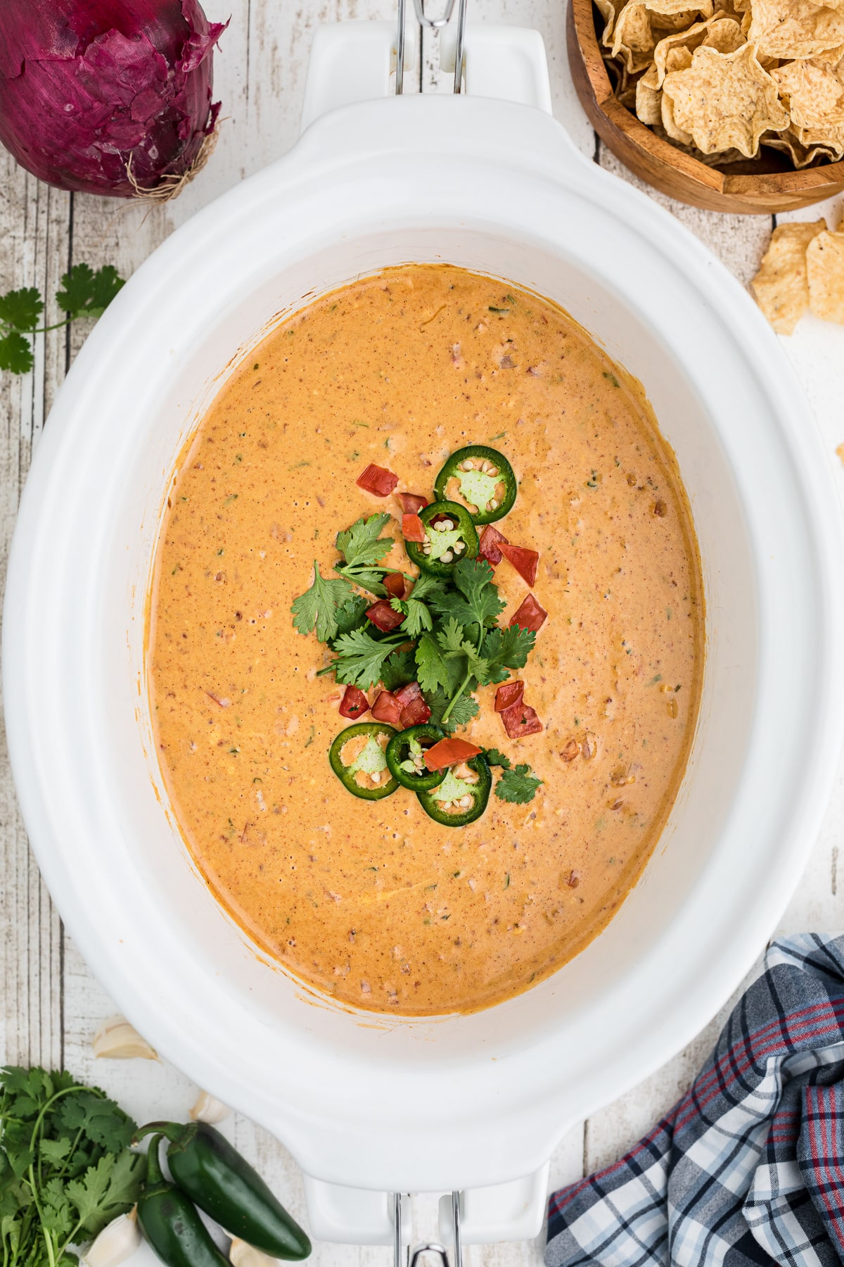 Smoked queso cooked in the crockpot.