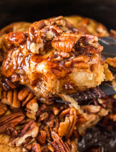 A sticky bun on a spatula.