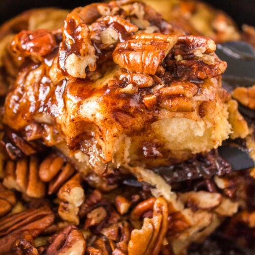 A sticky bun on a spatula.