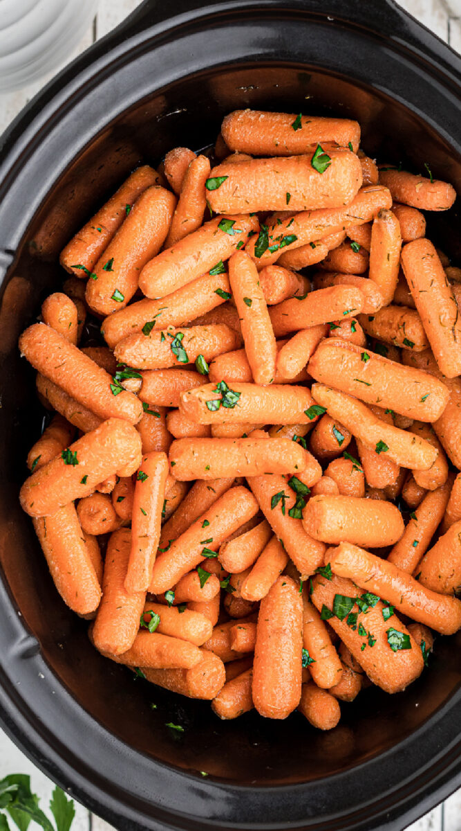 Long image of baby carrots.