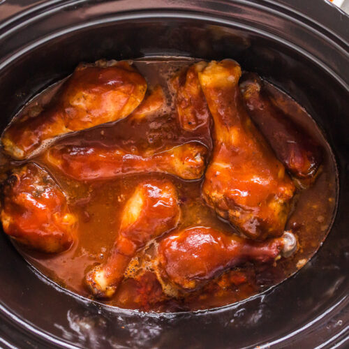 overhead shot of bbq drumsticks in crockpot.