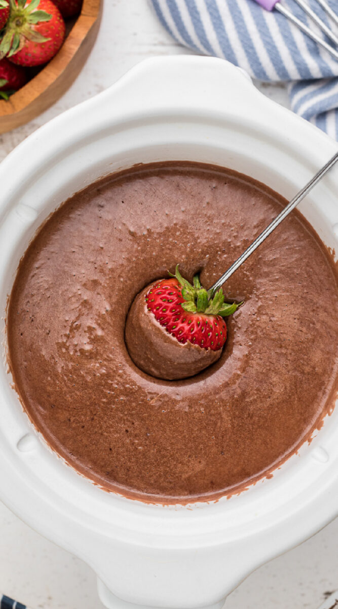 Close up long image of chocolate fondue.
