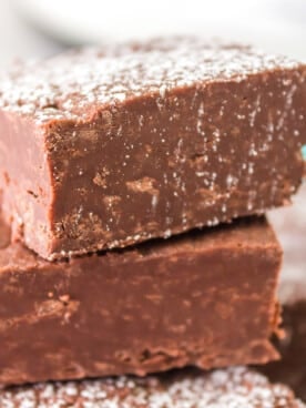 2 pieces of crockpot fudge stacked up.