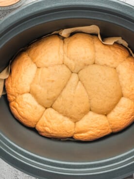 Cooked rolls in a crockpot.