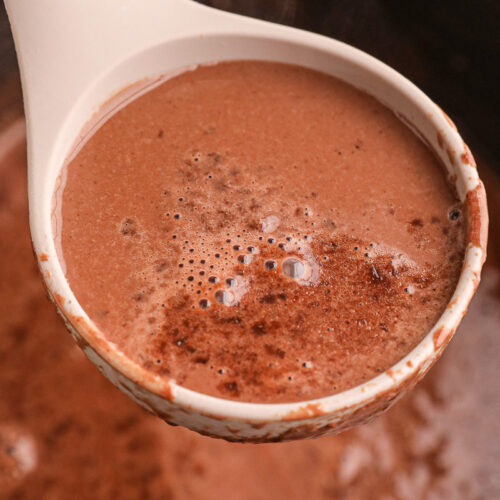 close up of hot chocolate on a spoon.