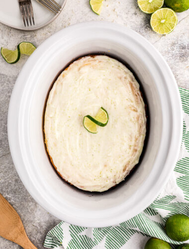 Overhead shot of glazed key lime cake in a crockpot.