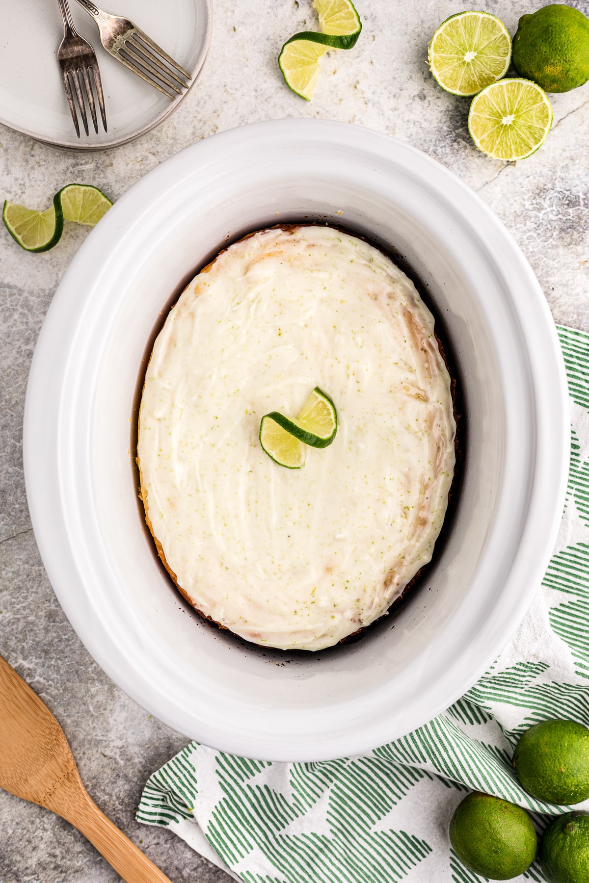 Overhead shot of glazed key lime cake in a crockpot.