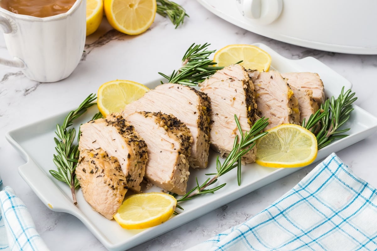 tray of turkey breast with lemon.