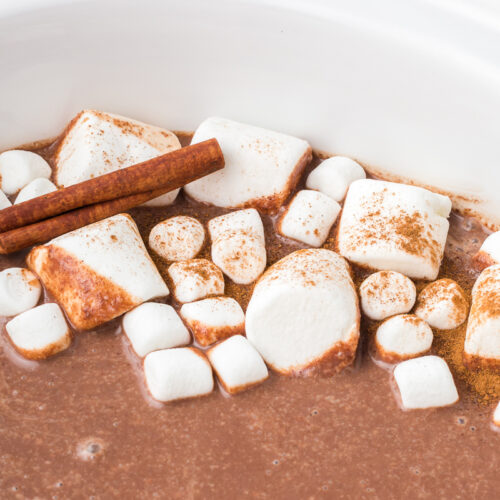 close up of marshamllows on mexican hot chocolate.