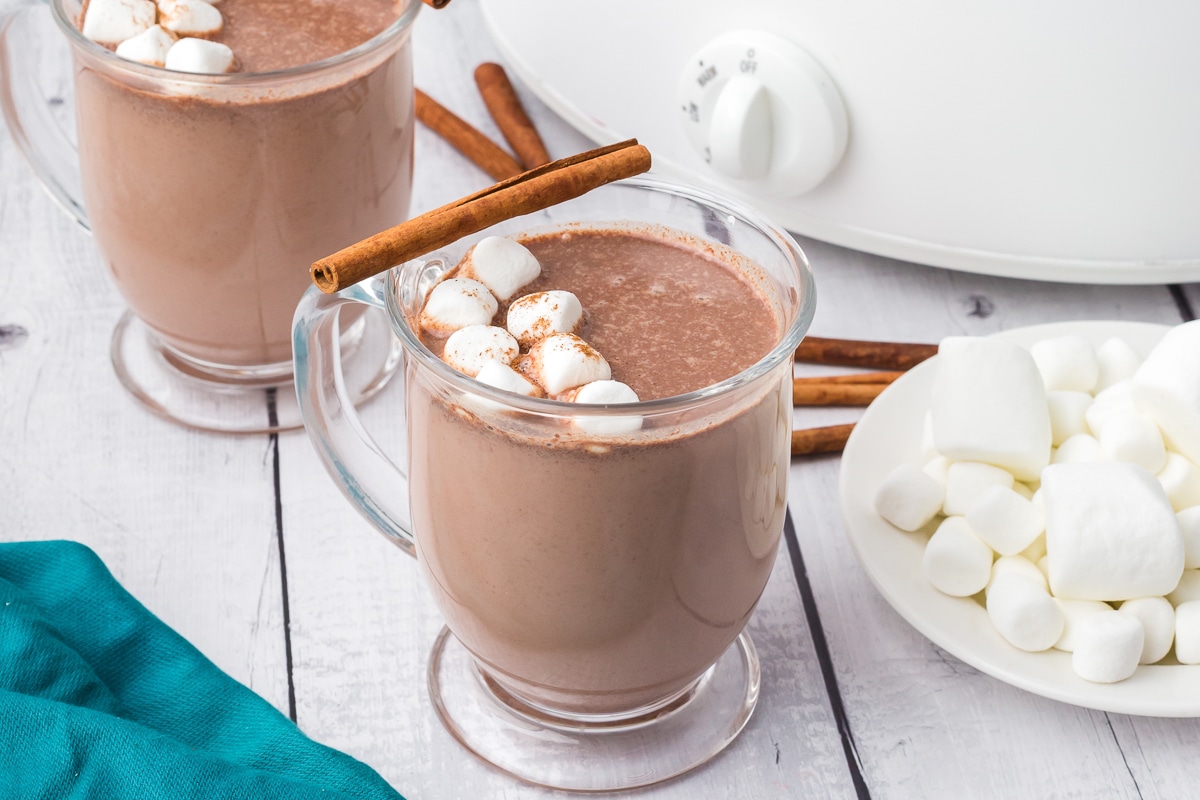 2 mugs of mexican hot chocolate in mugs.