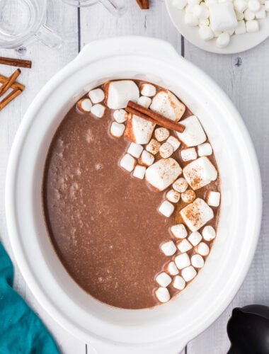 overhead shot of mexican hot chocolate with marshmallows on top.