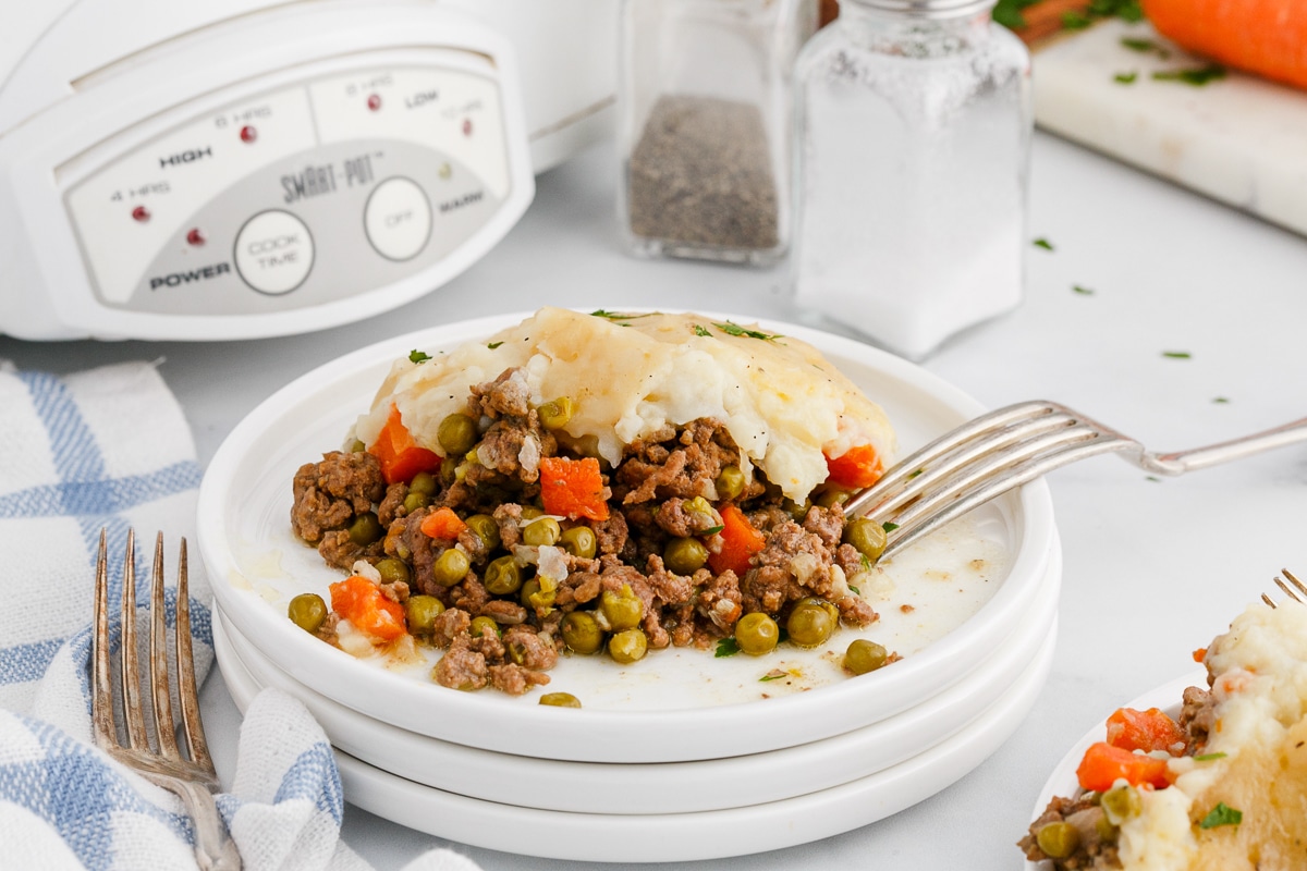 plate with a scoop of shepherd's pie on top.