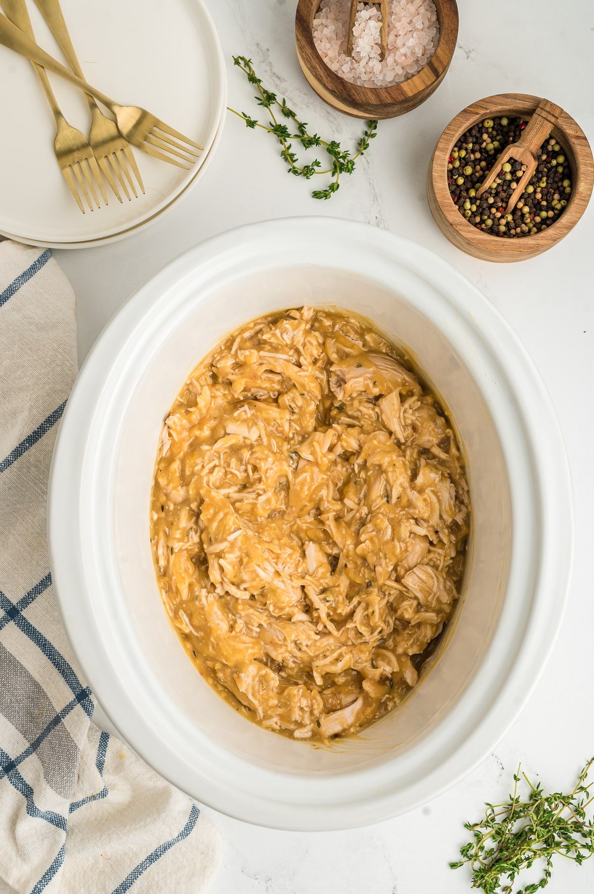 shredded turkey in a slow cooker.