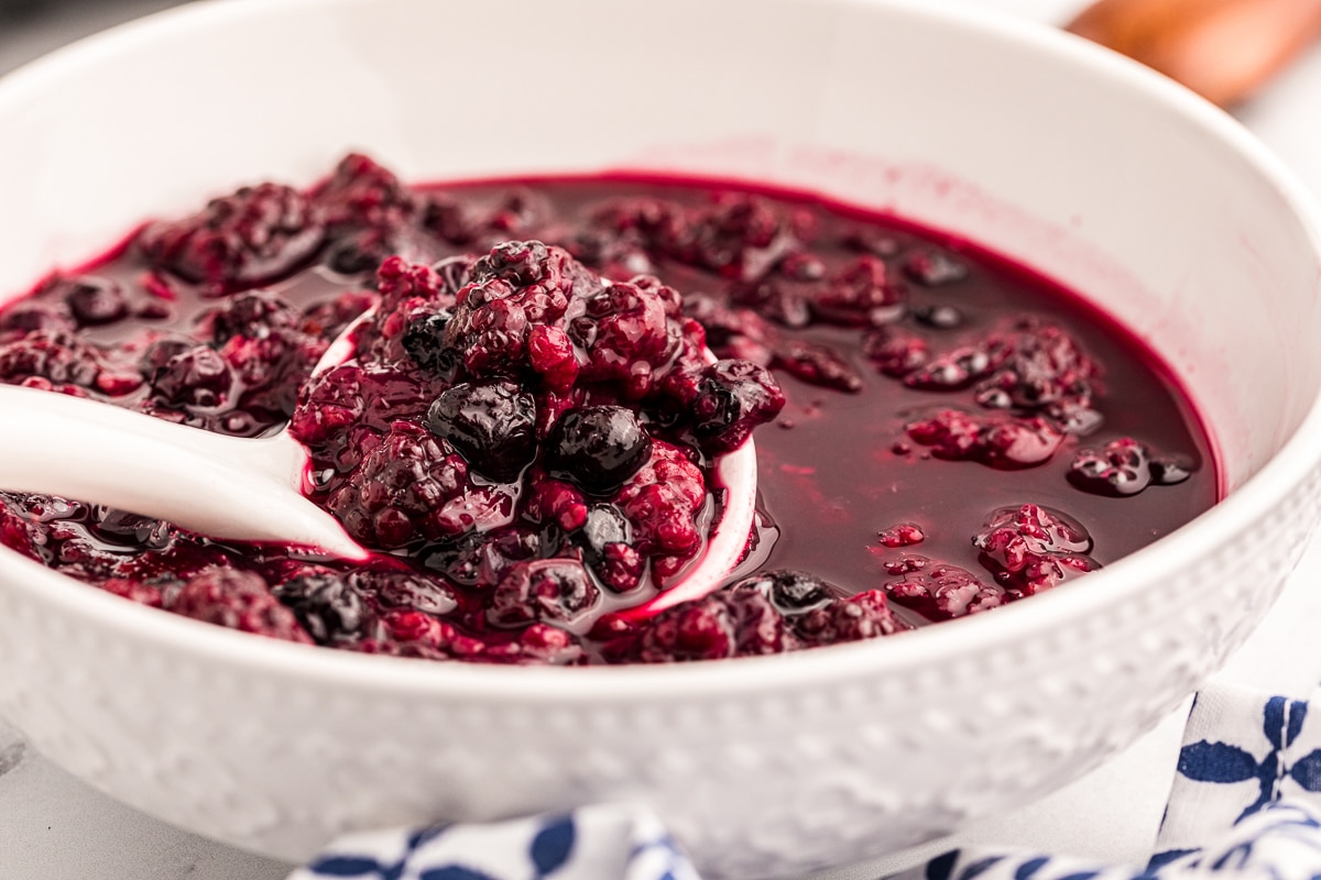 Bowl full of mixed berry compote.