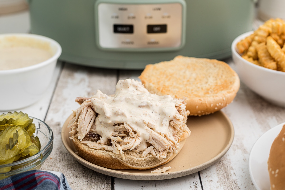 alabama chicken sandwich on a plate.