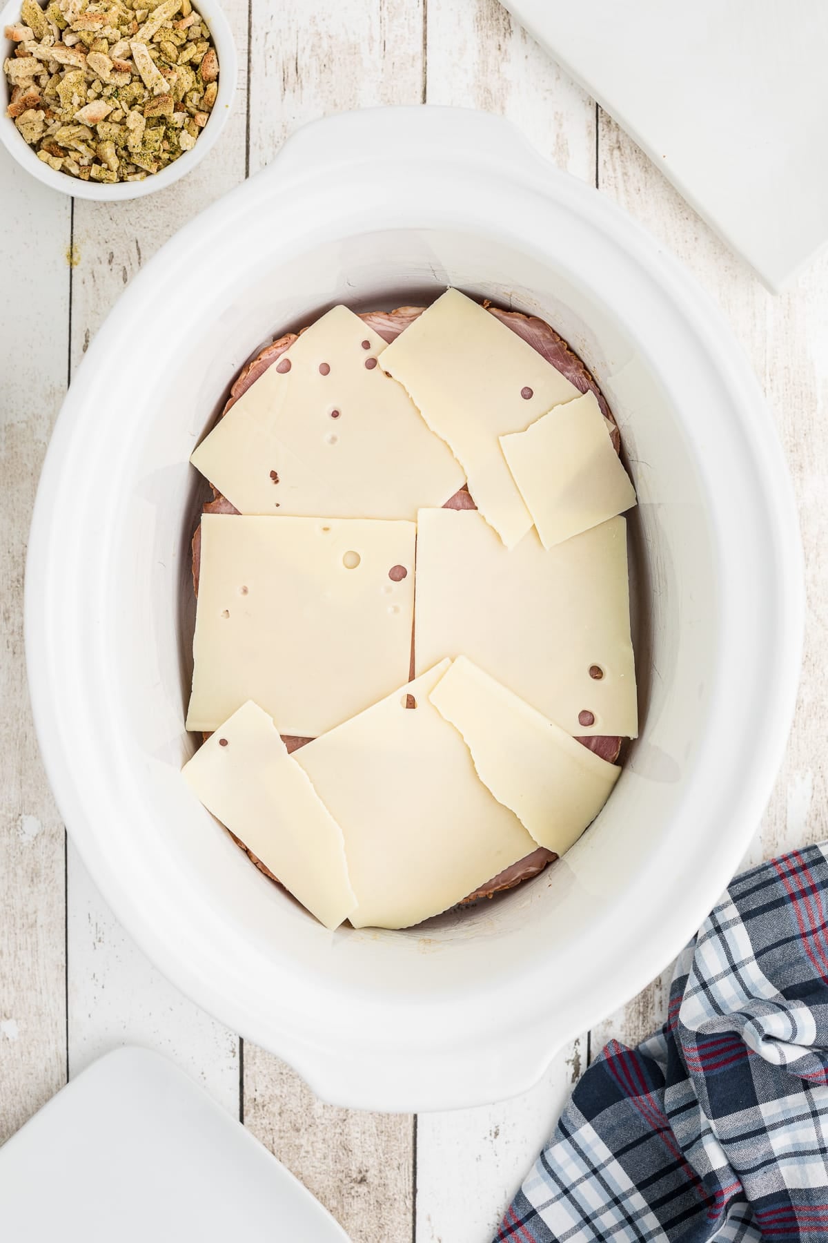 chicken, ham and swiss cheese in a slow cooker.