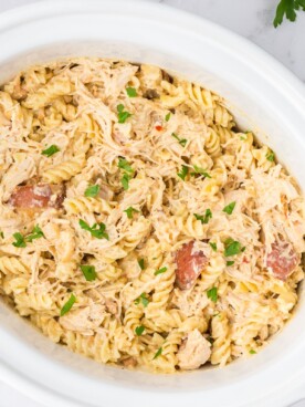 overhead shot of garlic parmesan pasta in a crockpot.