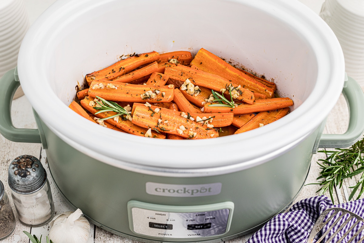 side view of carrots in a crockpot.
