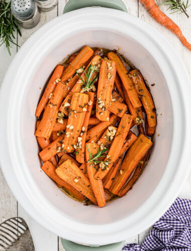 Overhead shot of honey garlic carrots in the slow cooker.